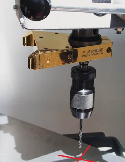 Laser optics for drill hole positioning